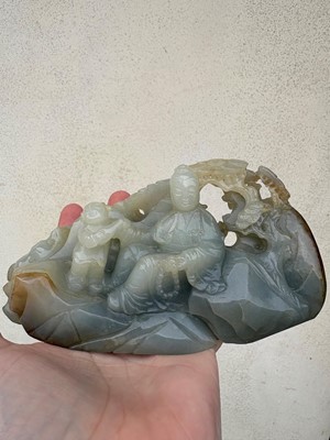 Lot 62 - A carved jade figural group