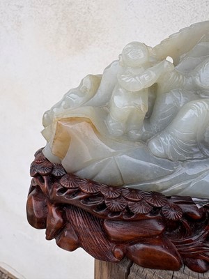 Lot 62 - A carved jade figural group