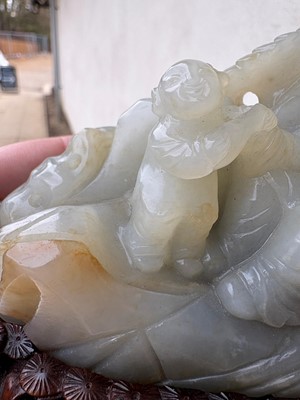 Lot 62 - A carved jade figural group