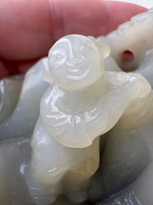 Lot 62 - A carved jade figural group