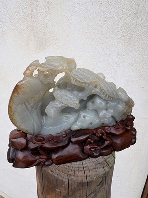 Lot 62 - A carved jade figural group