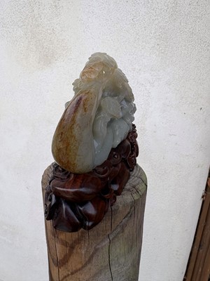 Lot 62 - A carved jade figural group
