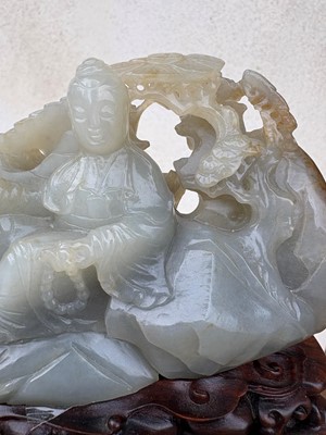 Lot 62 - A carved jade figural group