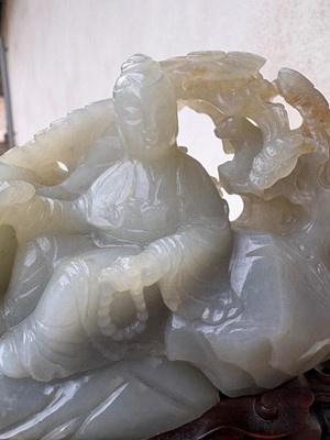 Lot 62 - A carved jade figural group