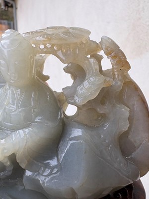 Lot 62 - A carved jade figural group