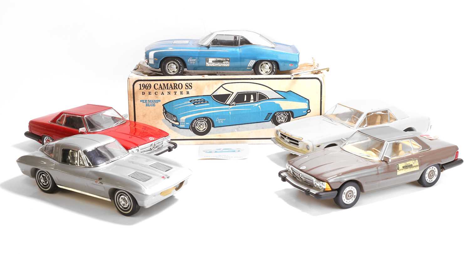Lot 19 - A collection of model car whiskey decanters