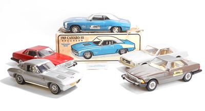 Lot A collection of model car whiskey decanters