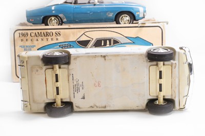 Lot 19 - A collection of model car whiskey decanters
