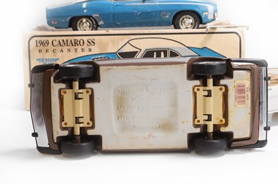Lot 19 - A collection of model car whiskey decanters