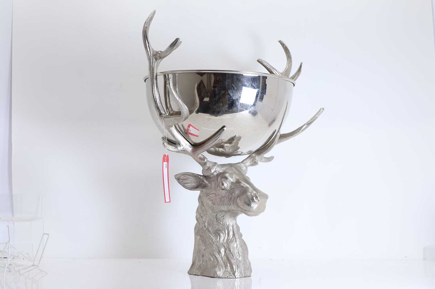 Lot 311 - A silvered metal punch bowl mounted on a stag