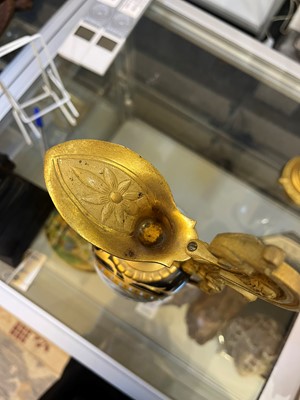 Lot 106 - A pair of ormolu-mounted porcelain ewers