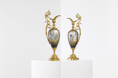 Lot 106 - A pair of ormolu-mounted porcelain ewers