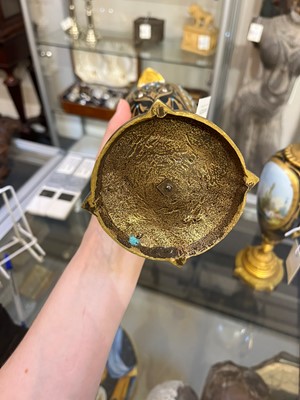Lot 106 - A pair of ormolu-mounted porcelain ewers