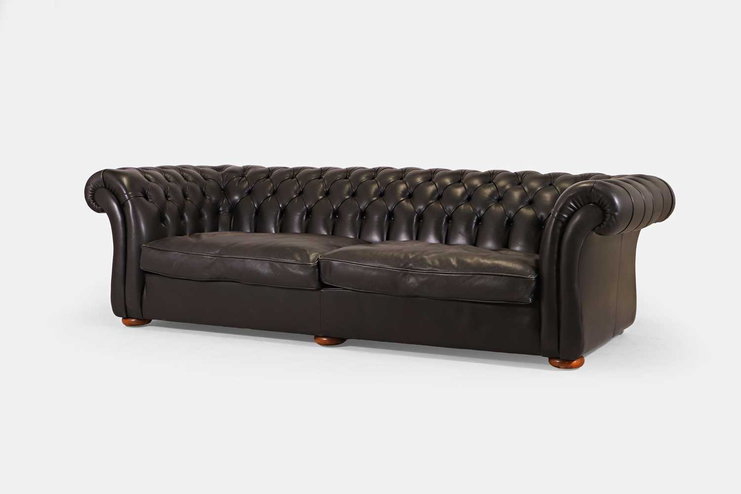 Lot 262 - A large two-piece chesterfield sofa by Terence Conran