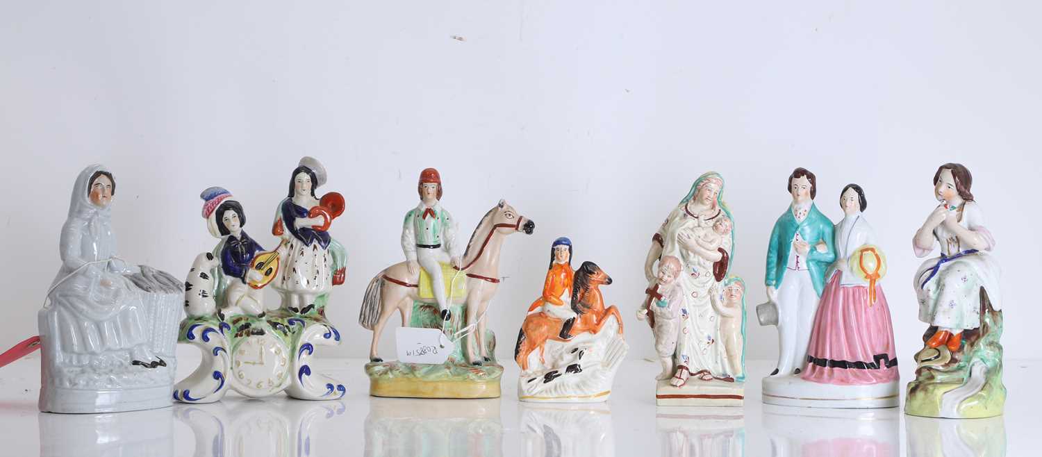 Lot 104 - A collection of Staffordshire flatbacks