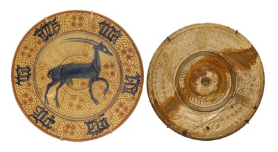 Lot 66 - A Hispano-Moresque earthenware lustre dish
