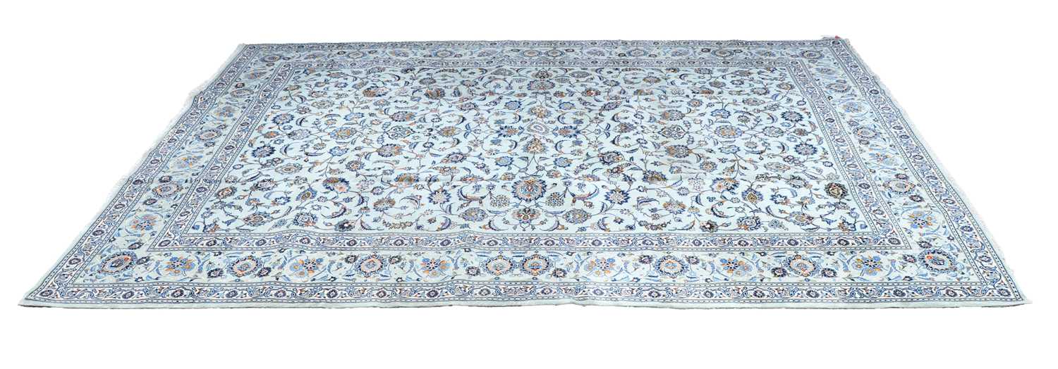 Lot 423 - A signed central Persian Kashan carpet
