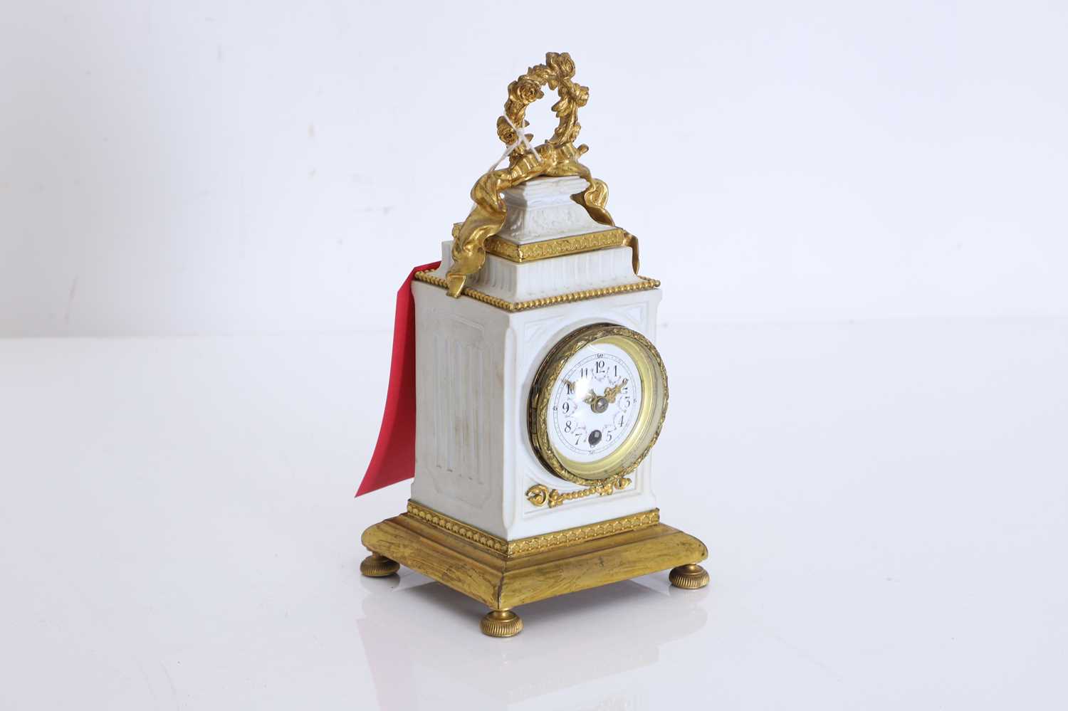 Lot 203 - A French bisque and gilt clock