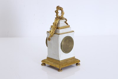 Lot 203 - A French bisque and gilt clock