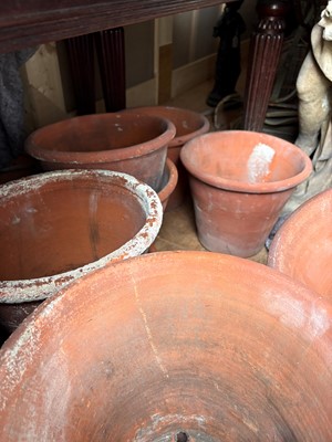 Lot 560 - Sixteen various unglazed terracotta garden pots, and a large conservatory pot