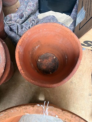 Lot 560 - Sixteen various unglazed terracotta garden pots, and a large conservatory pot