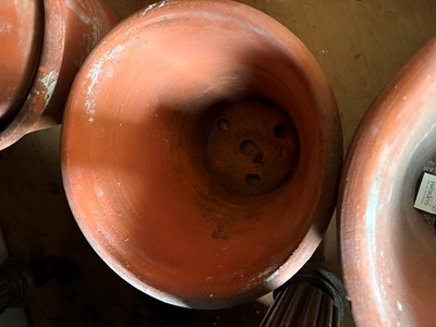 Lot 560 - Sixteen various unglazed terracotta garden pots, and a large conservatory pot