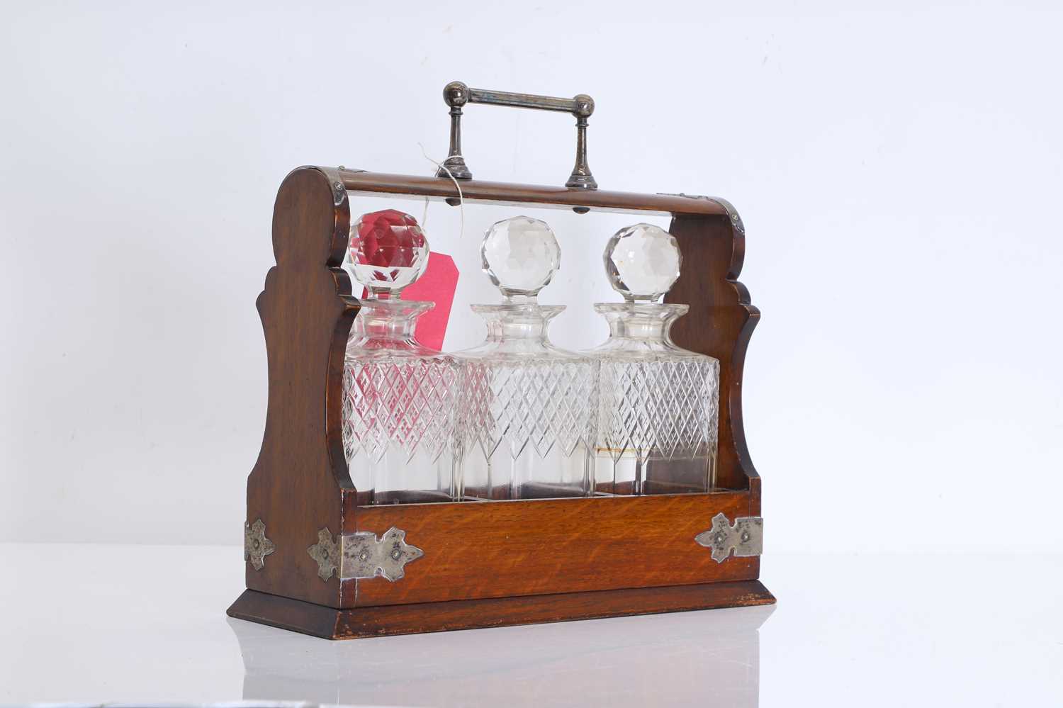 Lot 309 - A Victorian three bottle cut glass tantalus