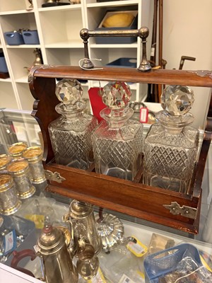 Lot 309 - A Victorian three bottle cut glass tantalus