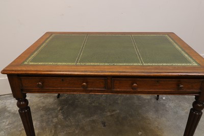 Lot 526 - A Victorian oak writing table