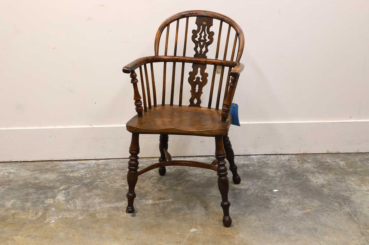 Lot 524 - A yew wood windsor chair