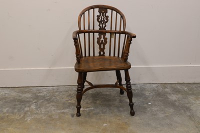 Lot 524 - A yew wood windsor chair