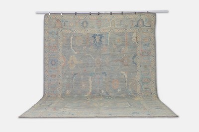 Lot 135 - An Oushak wool carpet