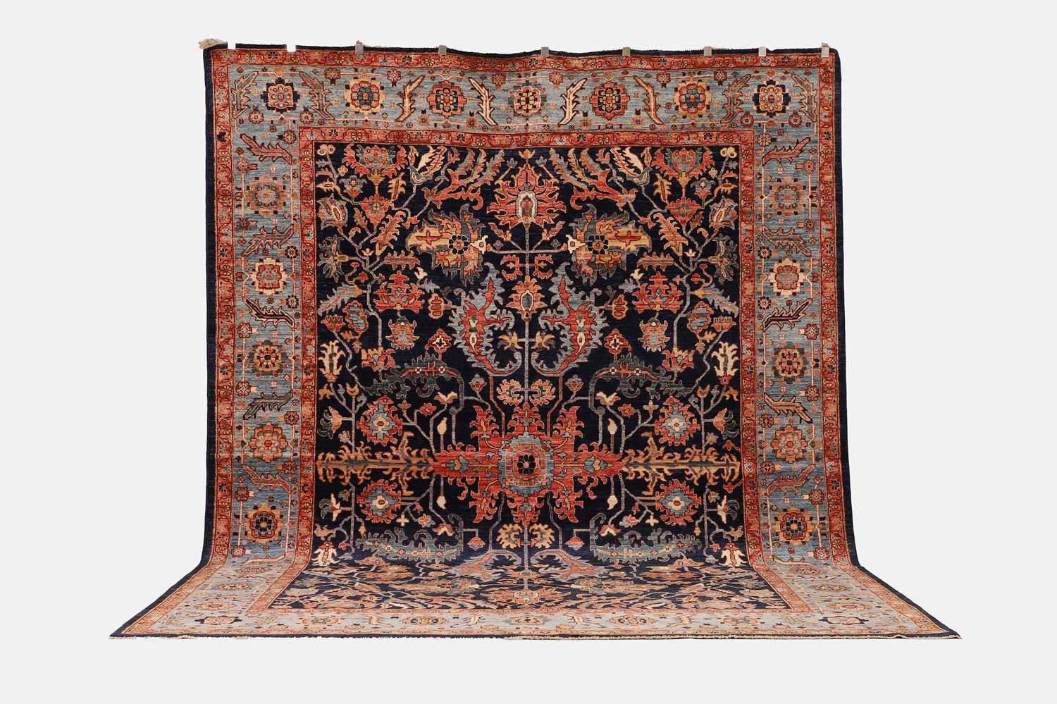 Lot 71 - A wool carpet of antique Persian Heriz design