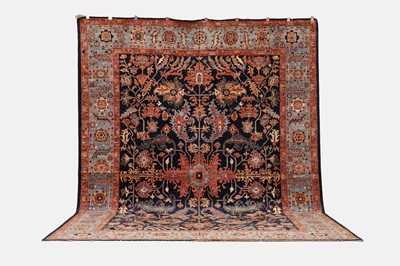 Lot 71 - A wool carpet of antique Persian Heriz design
