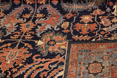 Lot 71 - A wool carpet of antique Persian Heriz design