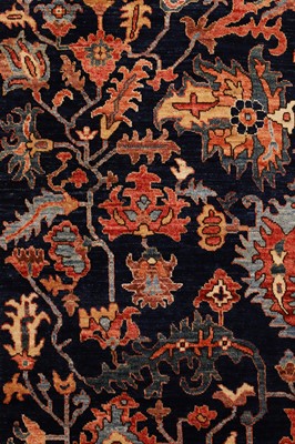 Lot 71 - A wool carpet of antique Persian Heriz design