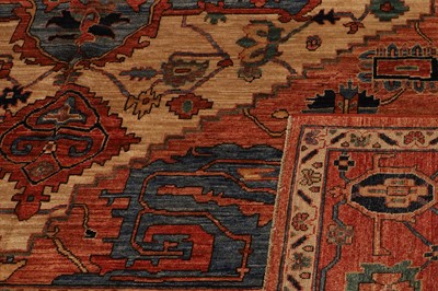 Lot 155 - A wool carpet of antique Persian Heriz design