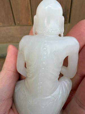 Lot 57 - A small Chinese carved jade figure of an emaciated Luohan
