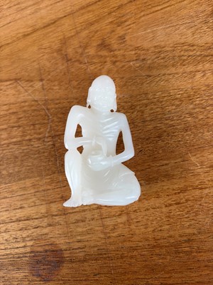 Lot 57 - A small Chinese carved jade figure of an emaciated Luohan
