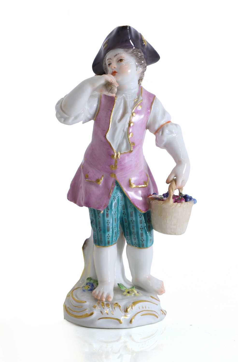 Lot 133 - A Meissen porcelain figure of a young grape gatherer