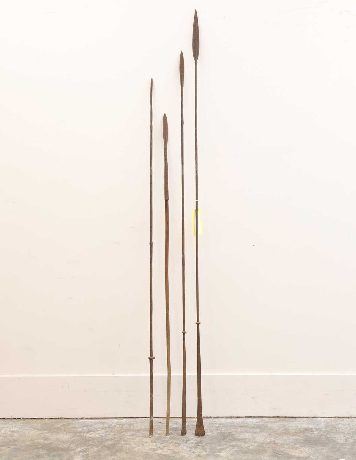 Lot 383 - Four tribal iron spears