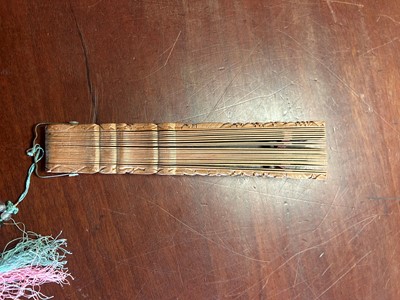 Lot 73 - A Chinese boxwood brisé fan