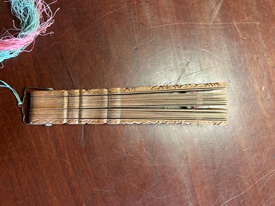 Lot 73 - A Chinese boxwood brisé fan