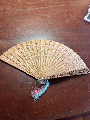 Lot 73 - A Chinese boxwood brisé fan
