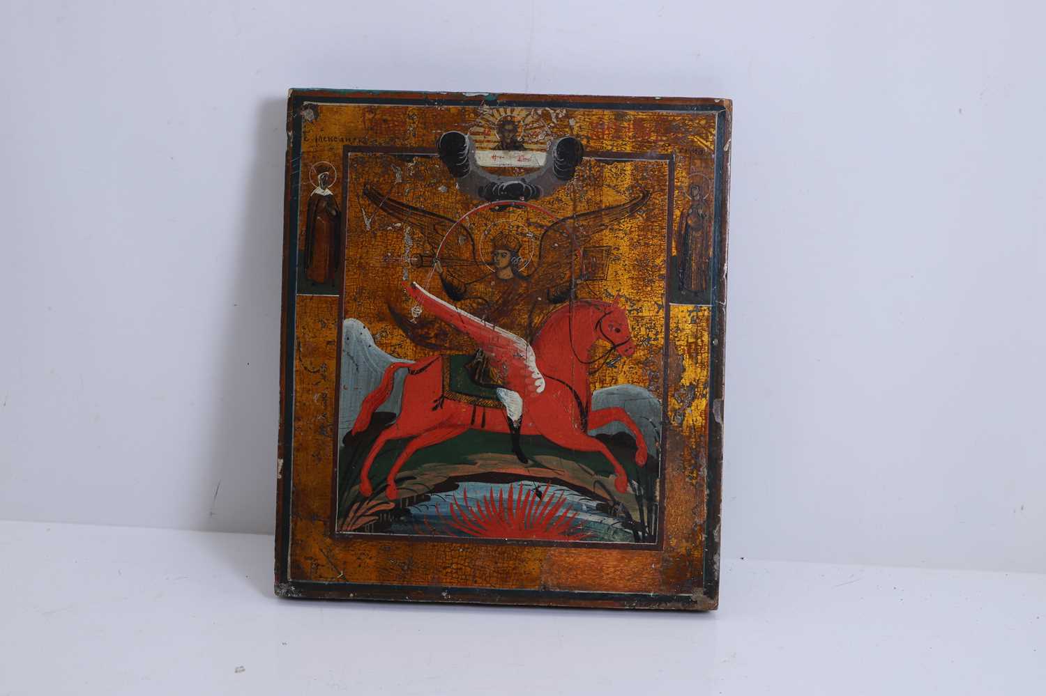Lot 301 - A Russian icon of the Archangel Michael