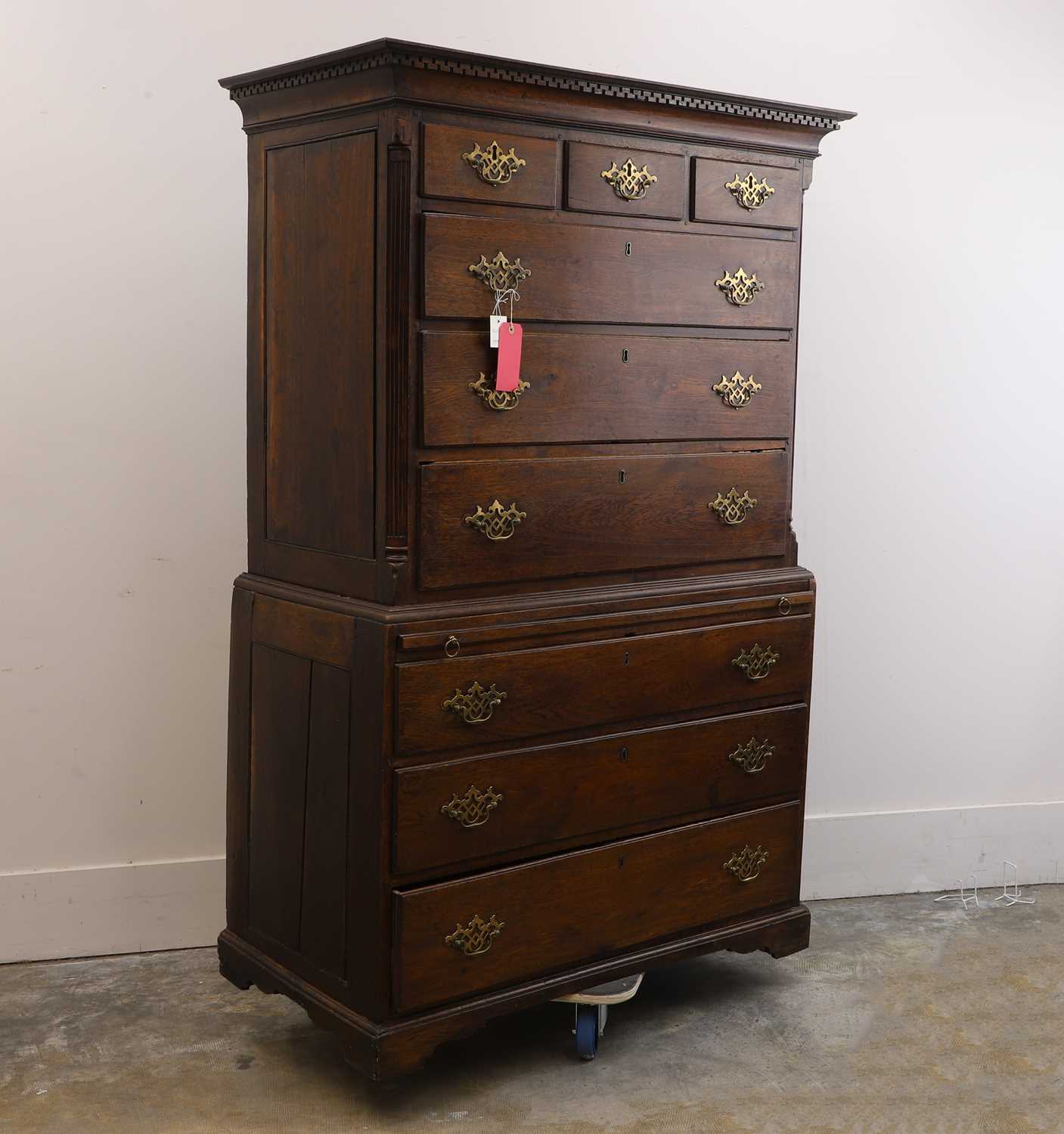 Lot 501 - A George III oak chest on chest