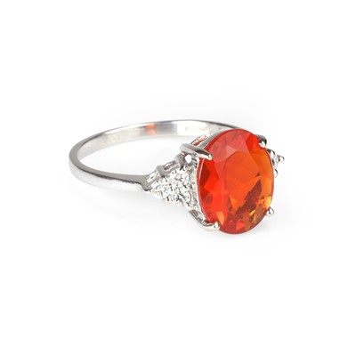 Lot 95 - An 18ct white gold fire opal and diamond ring