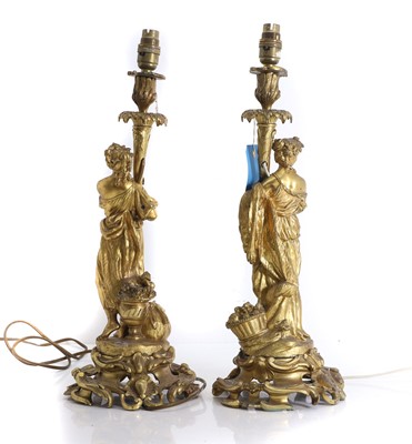 Lot 473 - A pair of gilt metal table lamps