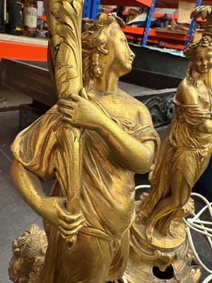 Lot 473 - A pair of gilt metal table lamps