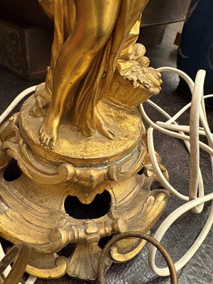 Lot 473 - A pair of gilt metal table lamps